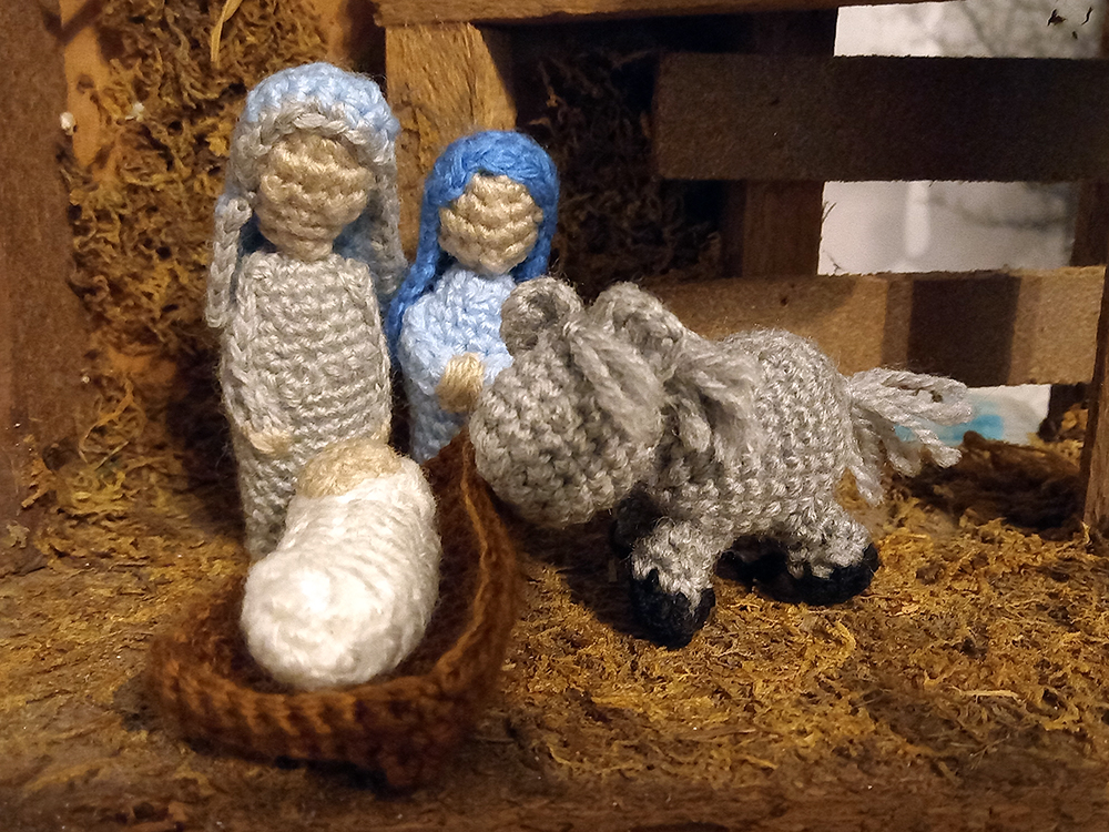 Crochet Mary, Joseph, Jesus in a manger, and donkey.
